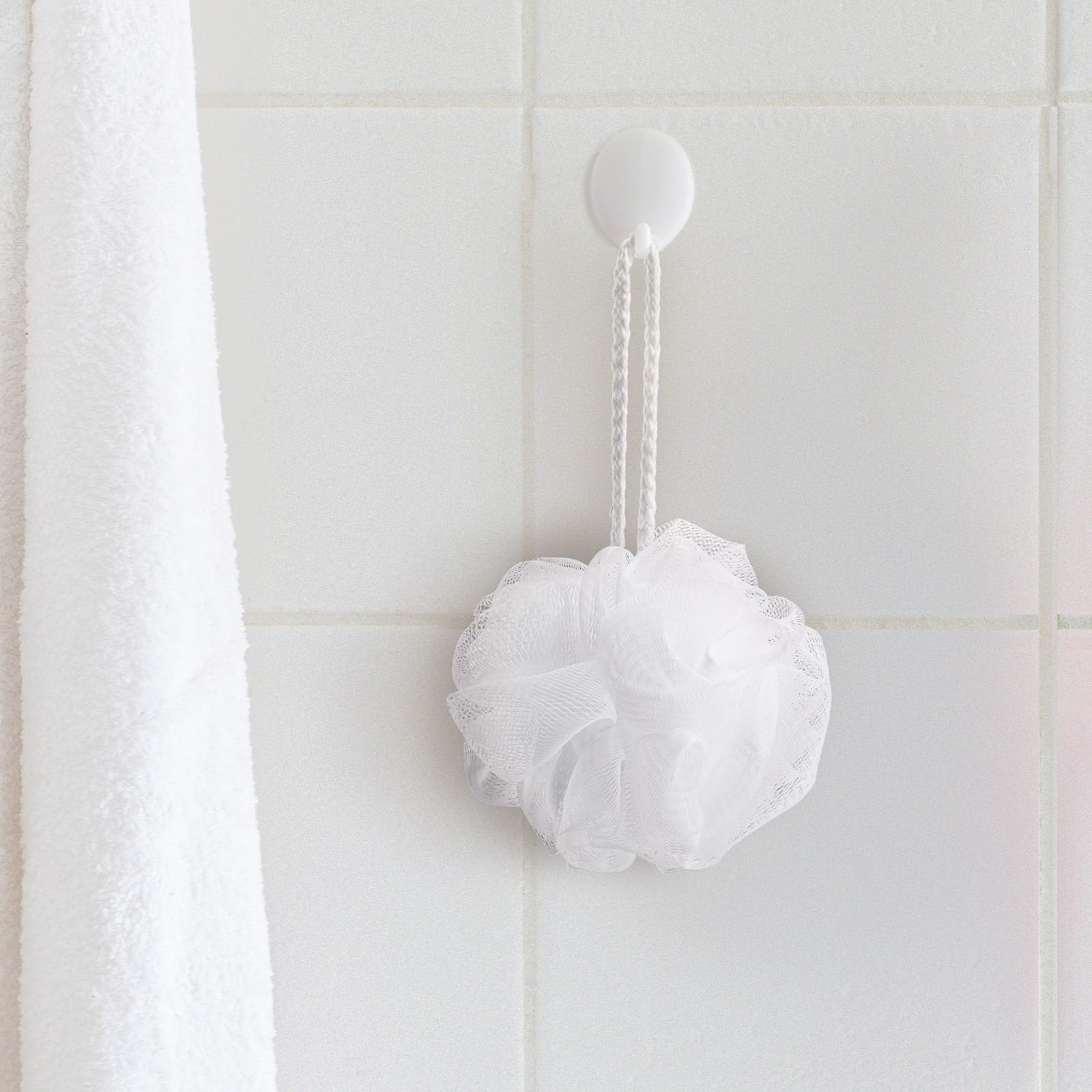 Funnymoom white multi-use loofah versatile for shower, dish scrubbing, or decor.