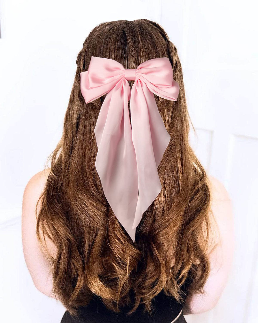 Furling Pompoms baby pink bow on clip, perfect for birthdays and parties
