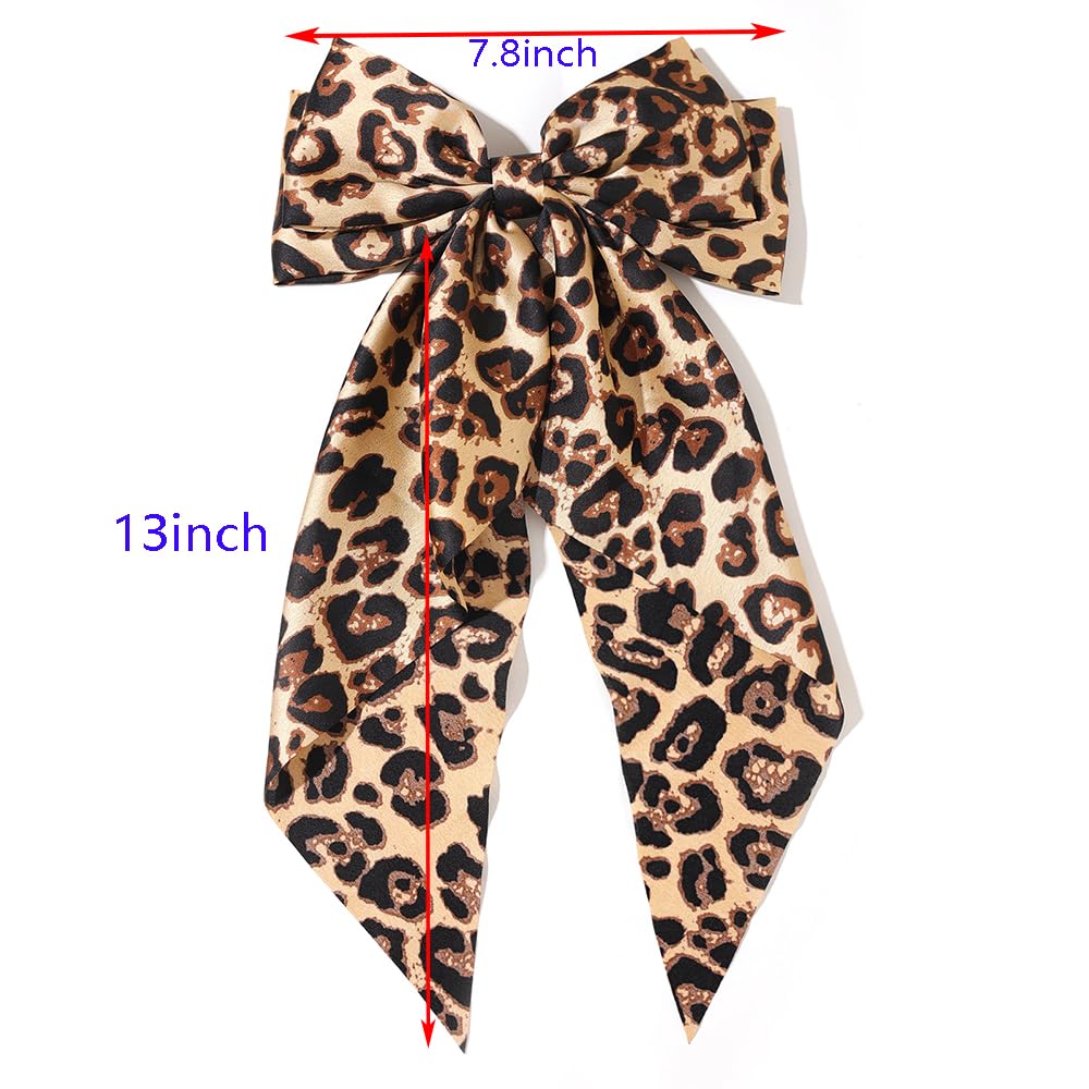 Furling Pompoms leopard hair bow camel close-up highlights premium satin finish.