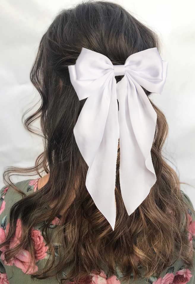 Furling Pompoms retro satin bow, elegant vintage-inspired clip.