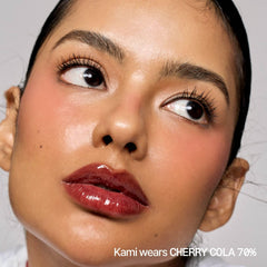 fwee 3D Voluming Gloss Cherry Cola 70% swatch on lip shows rich payoff