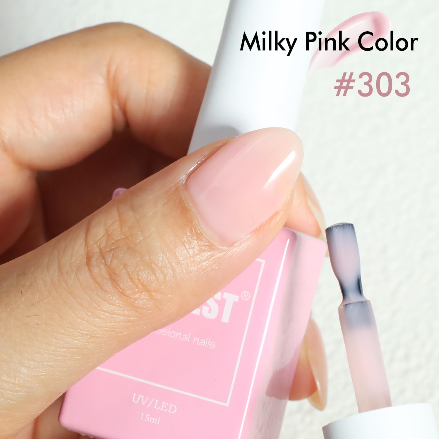 FZANEST Milky Pink nails with thin layers for a sheer natural finish