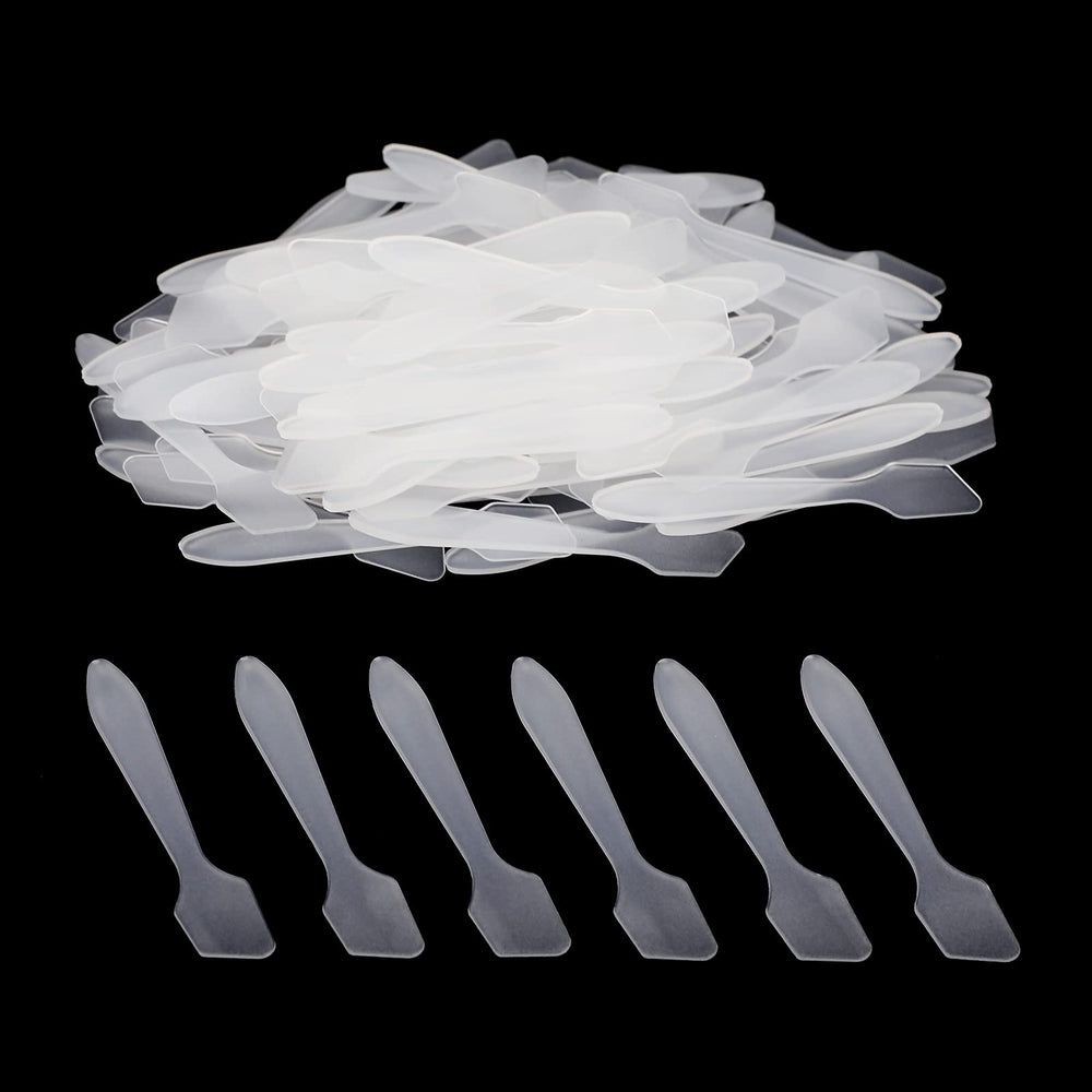 G2PLUS clear plastic cosmetic spatula showing hygienic, mess-free application.
