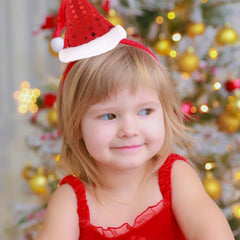 Gaduupa Santa hat headband on model demonstrates all-day comfort for parties.