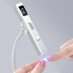 GAOY cordless nail lamp with stand in silver for stable, hands-free gel curing.