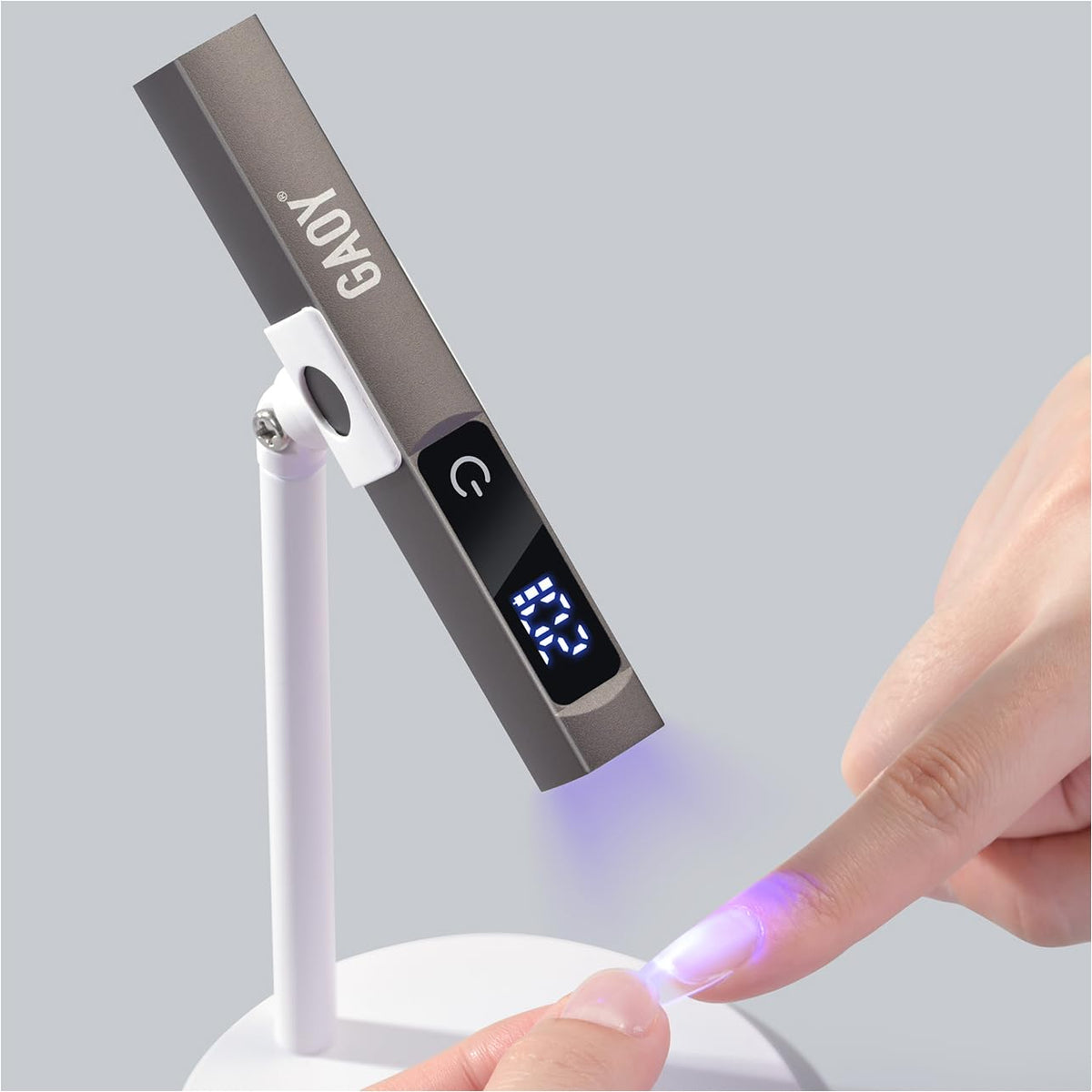 GAOY cordless UV light with stand enables hands-free curing for precise gel nails.