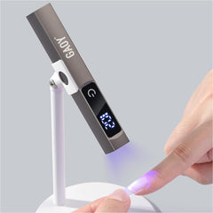 GAOY cordless UV light with stand enables hands-free curing for precise gel nails.