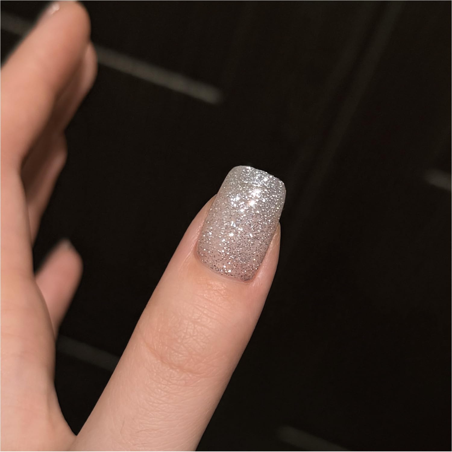 GAOY Silver Reflective Glitter Nail Polish closeup for dazzling party-ready nails