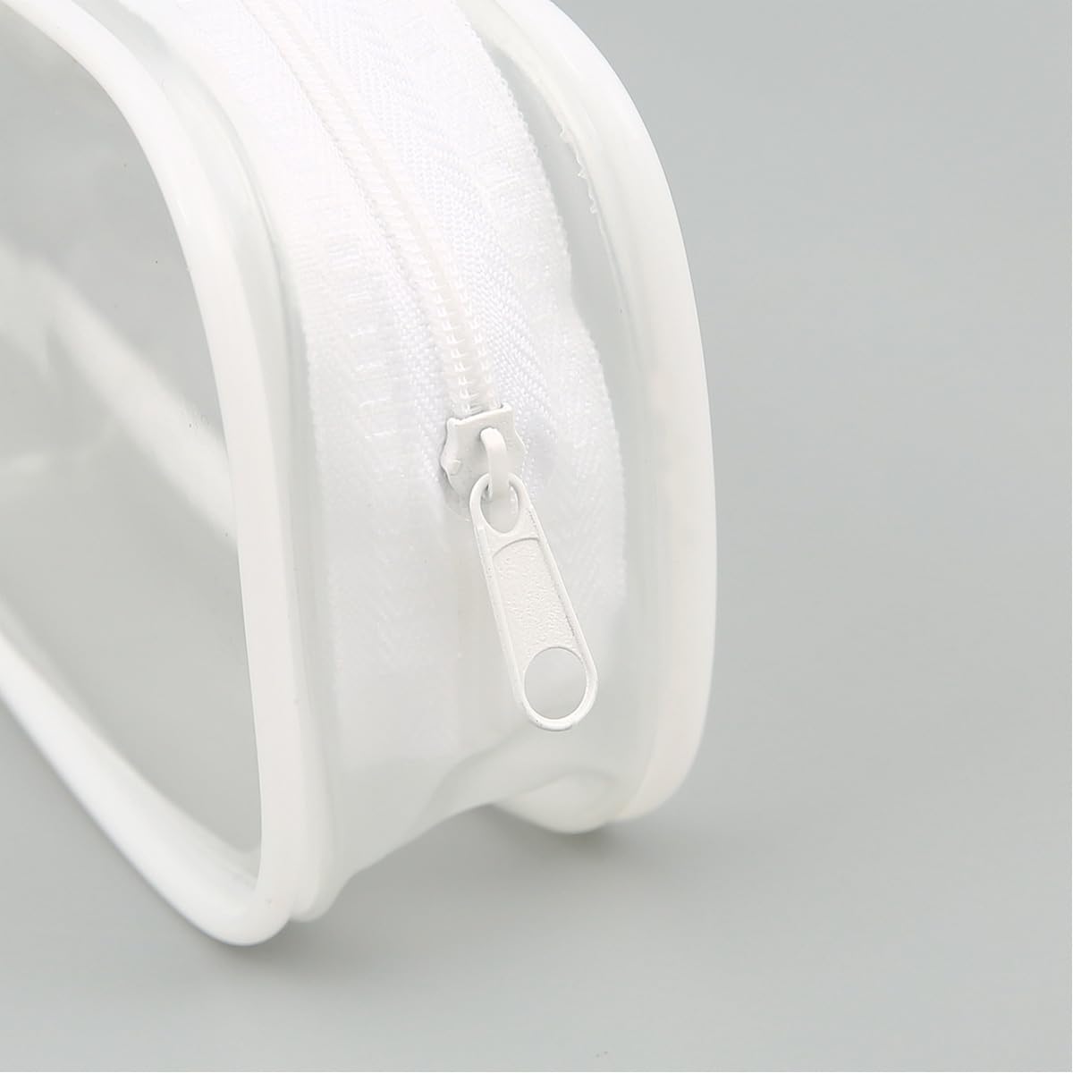 GAQWOK compact clear pouch works as a stationery or travel cosmetic bag.