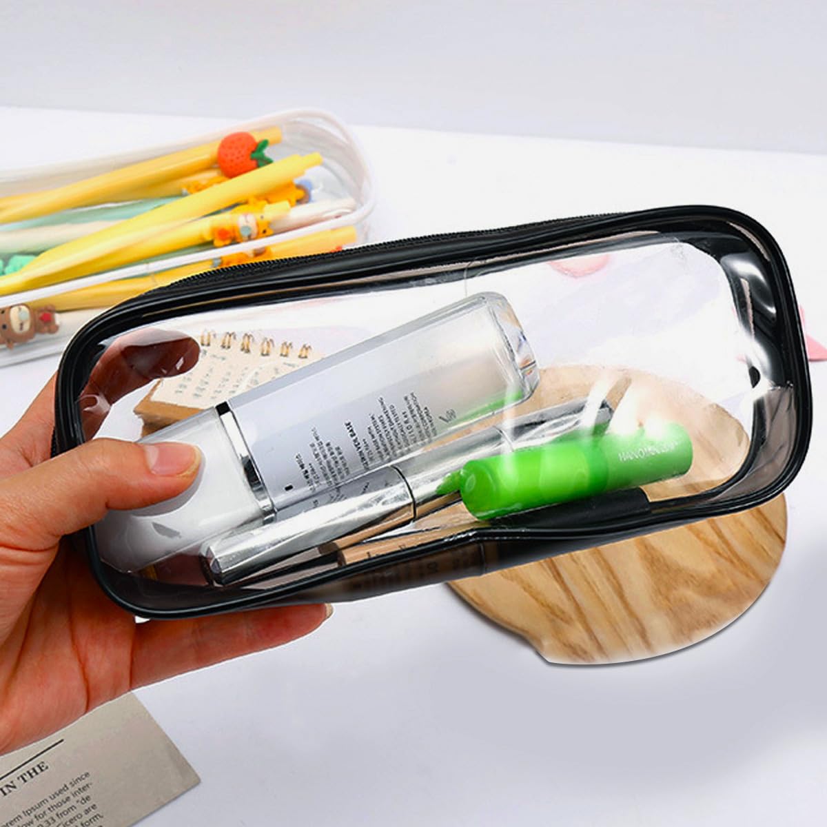 GAQWOK PVC clear bag resists leaks for toiletries and toothbrush travel.