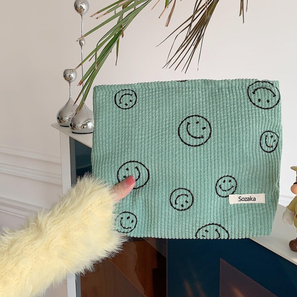 Gardsell corduroy cosmetic bag top view with organized interior for essentials.