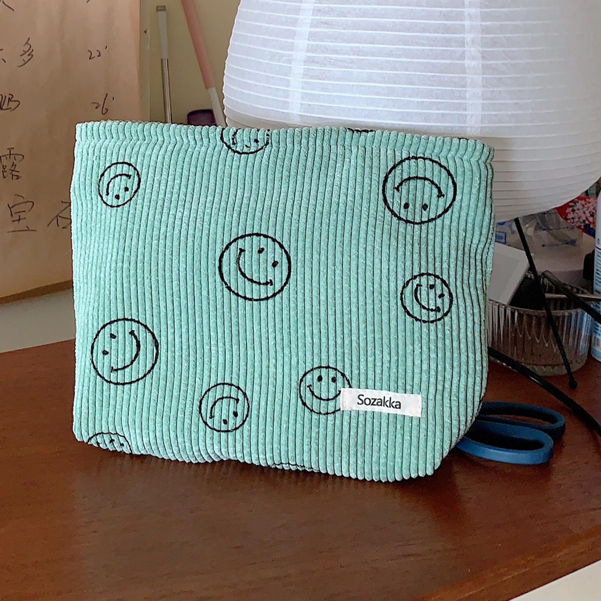 Gardsell corduroy cosmetic bag side view showing compact storage options.