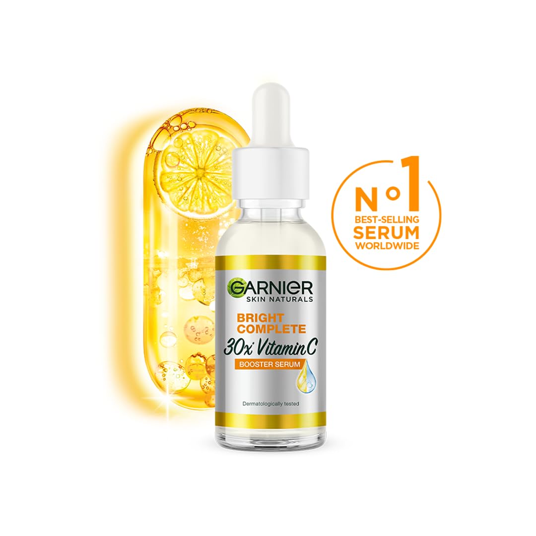Garnier Bright Complete Vitamin C Booster applying dots on face for an even complexion