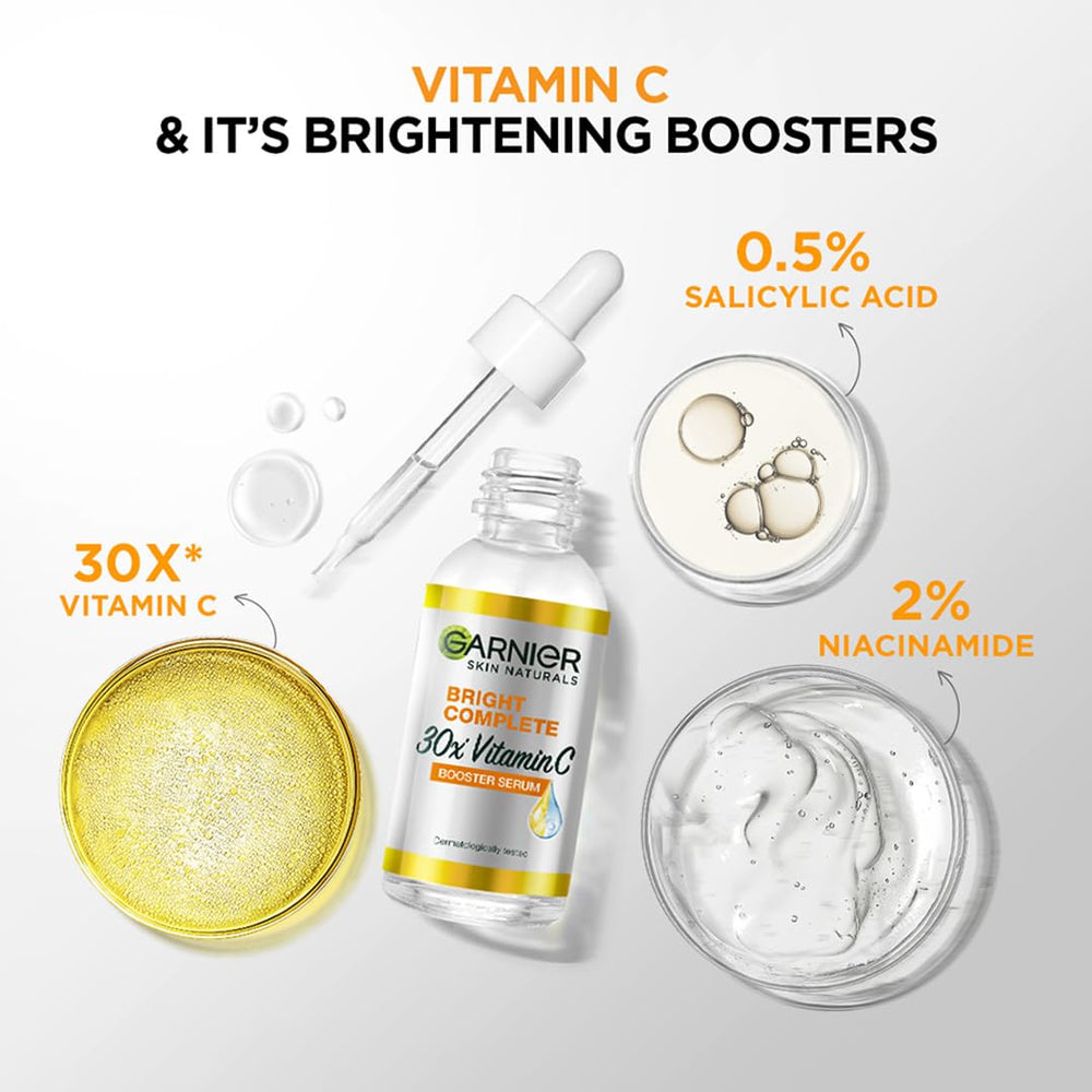 Garnier Bright Complete Vitamin C Booster packaging box displayed beside bottle