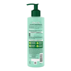Garnier Fructis Pure Clean 10-in-1 Leave-In Cream applied to hair for detangling and shine.