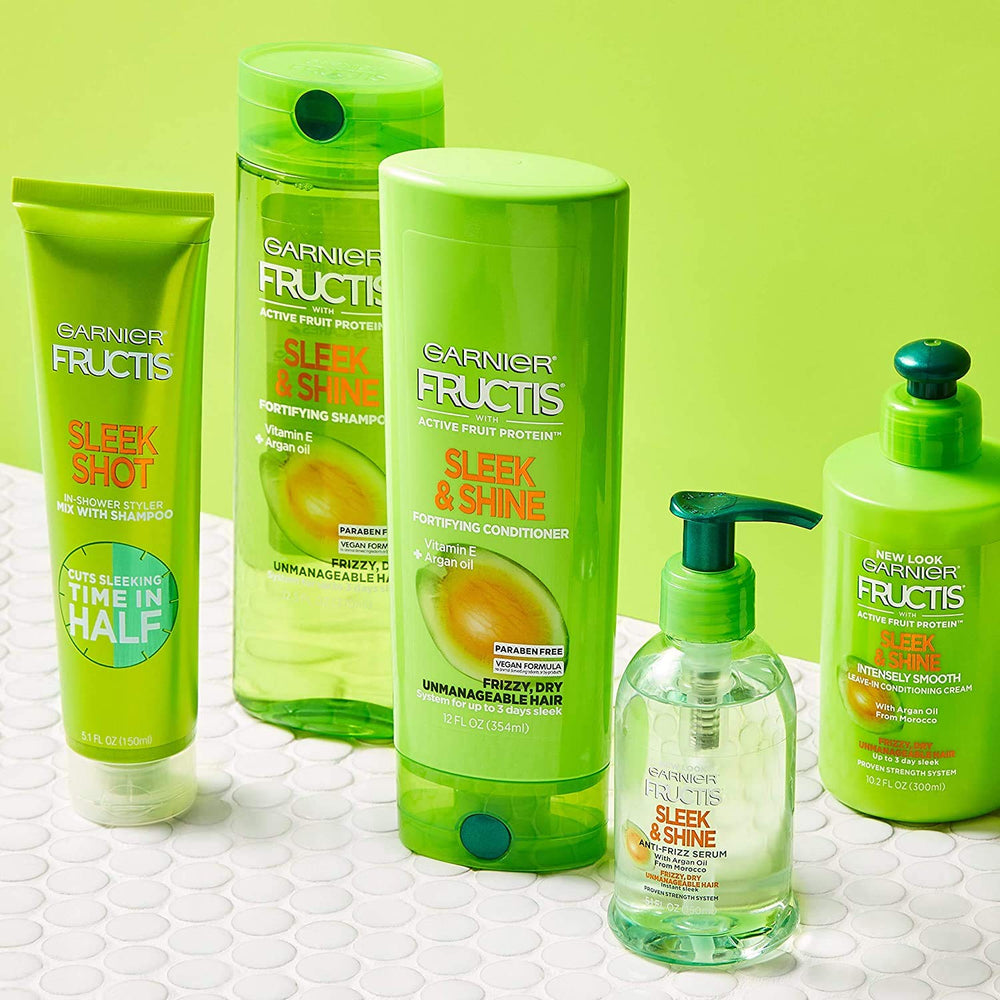 Garnier Fructis Sleek Shot mixing with shampoo shown in action