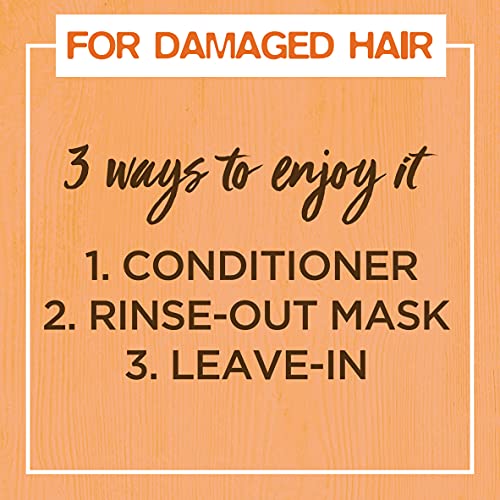 Garnier Hair Food Papaya 3-in-1 application on damp hair to tame flyaways.
