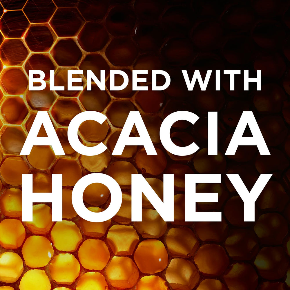 Garnier Whole Blends Honey Treasures product shown with heat styling tools