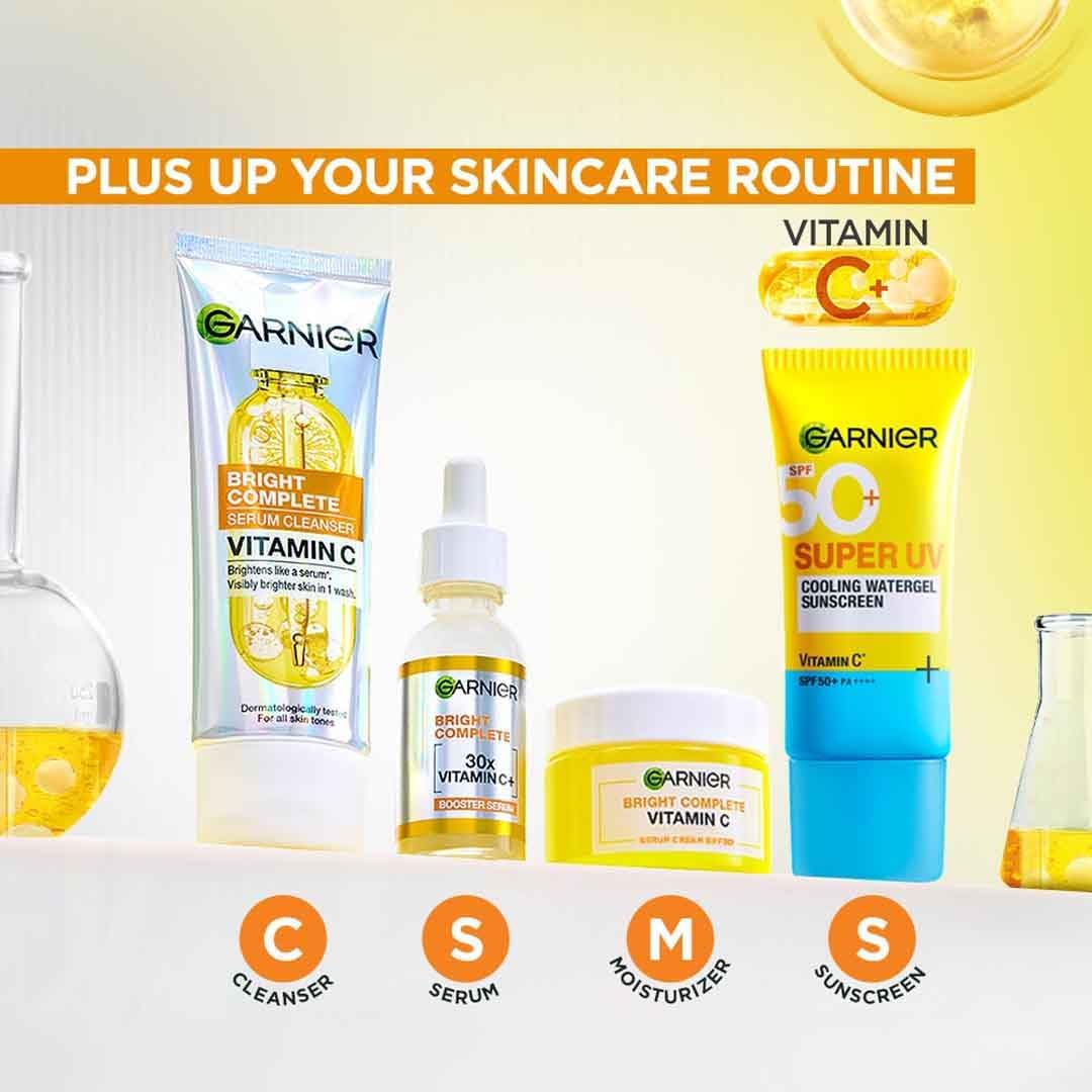 Garnier Skin Naturals Glow Serum on a bathroom shelf in a compact display.