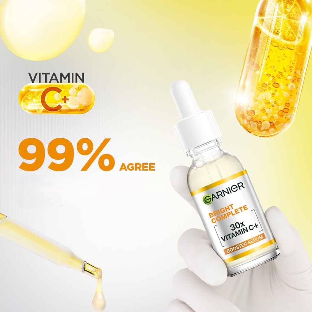 Garnier Skin Naturals Glow Serum dropper poised for clean, mess-free application.