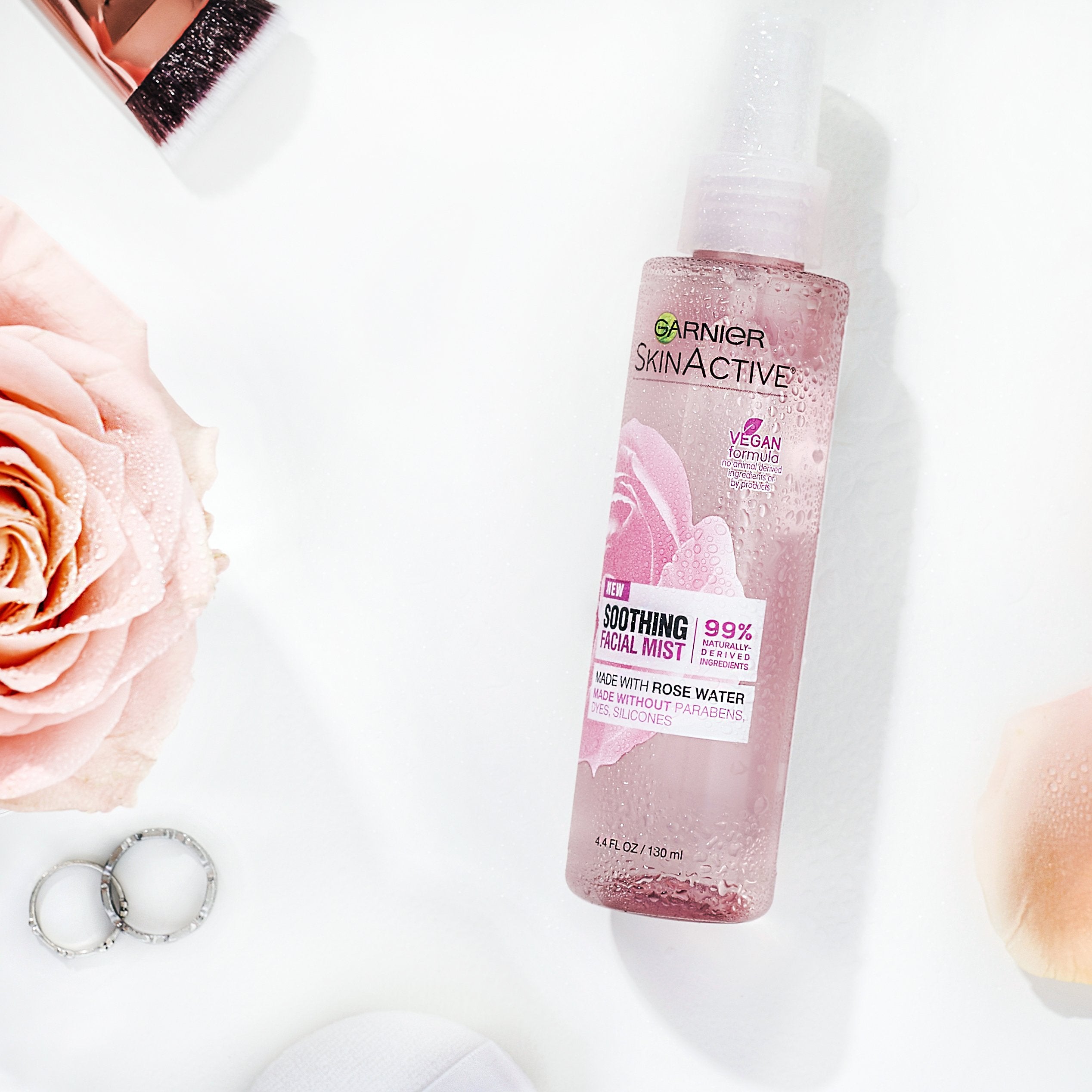 Garnier SkinActive rose water mist closeup with rose for calming skin.