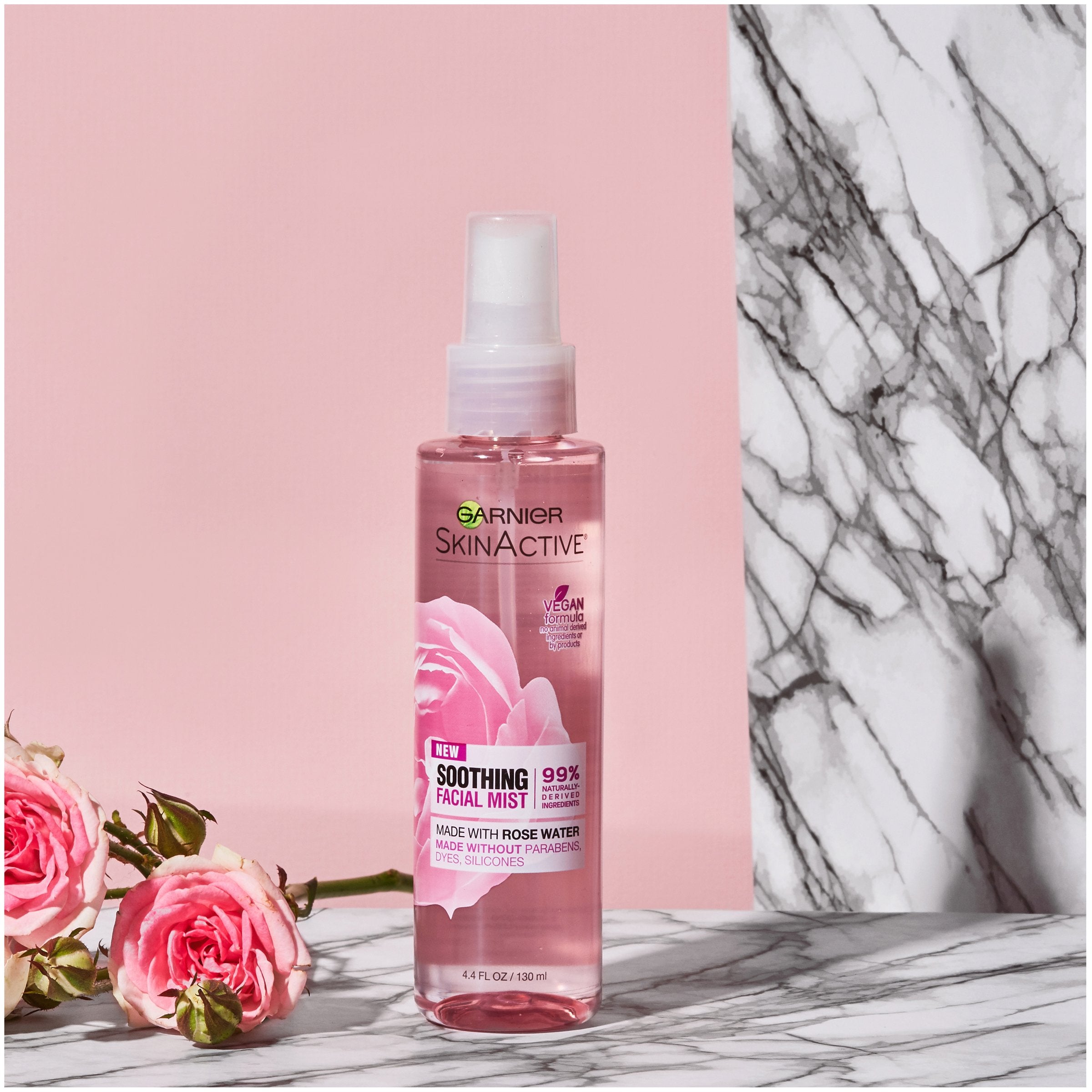 Garnier SkinActive rose water mist on face for quick pick-me-up.