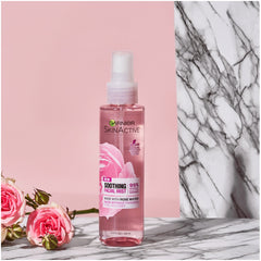 Garnier SkinActive rose water mist on face for quick pick-me-up.