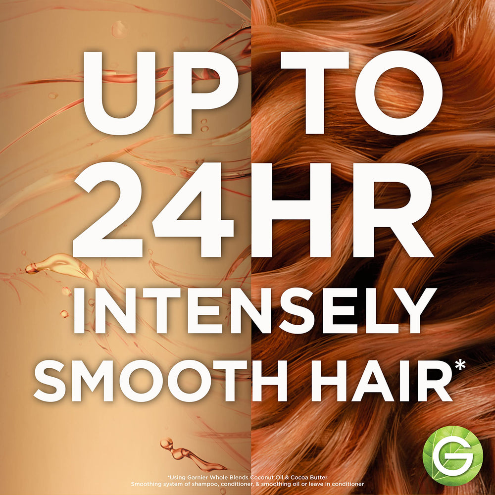 Garnier Whole Blends cocoa butter conditioner bottle tip demonstrates nourished hair