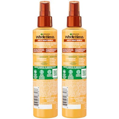 Garnier Whole Blends Honey Milk mist-dispense offers lightweight frizz control during styling.