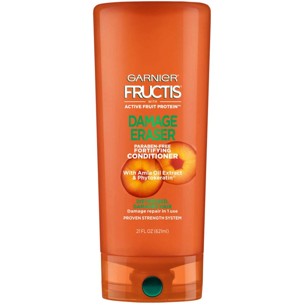 Garnier Fructis Damage Eraser Conditioner bottle shown for powerful repair in one use.