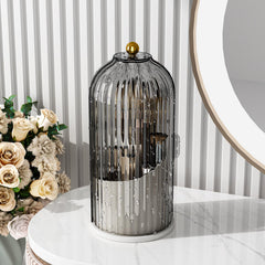 GAXmi makeup brush holder with lid keeps brushes protected and organized on the vanity.
