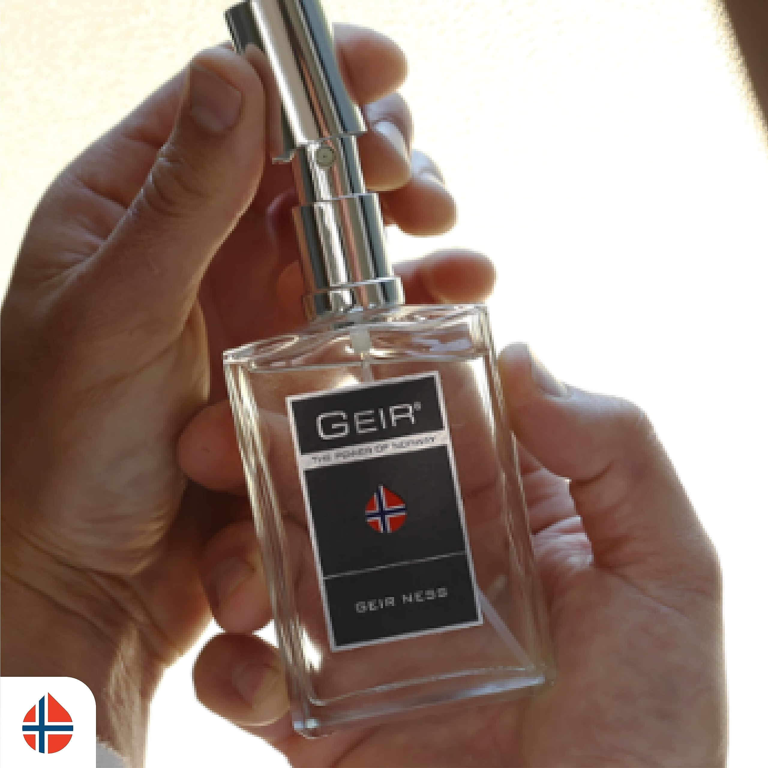 Geir Ness wrist spritz shows discreet application for office or social settings.