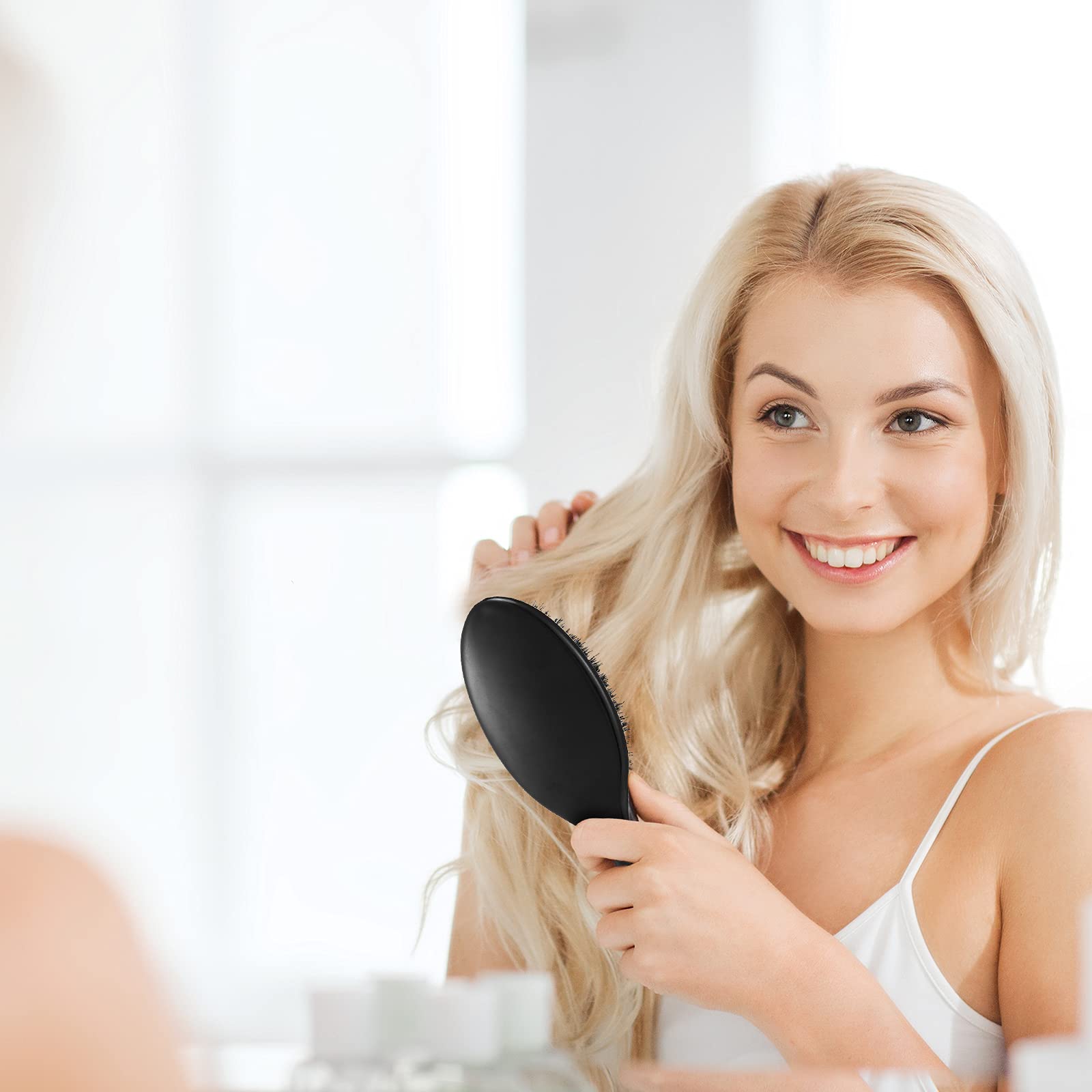 Geiserailie hair brush-ergonomic-handle demonstrates a non-slip grip for comfortable shower-time brushing.