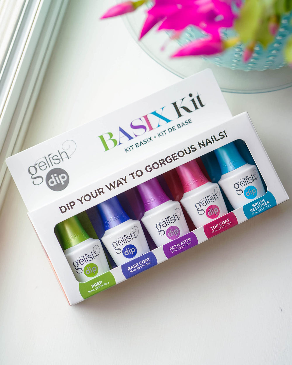 Gelish Dip Basix Kit Base Coat bottle ready to prime nails for long-lasting color.