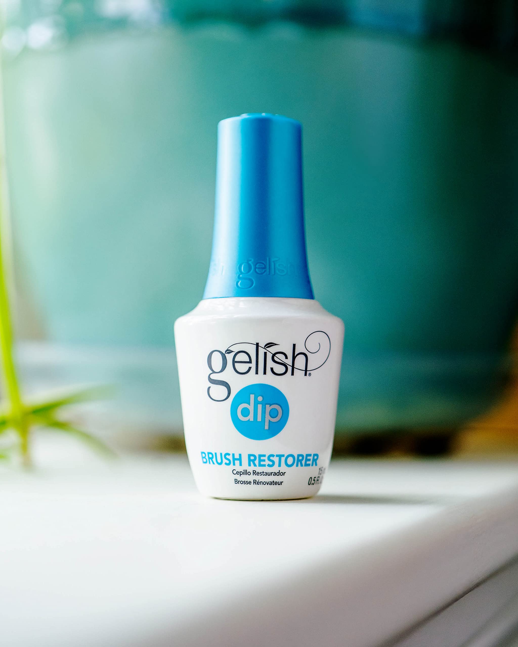 Gelish Dip Basix Kit Brush Restorer keeps brushes clean for reuse.