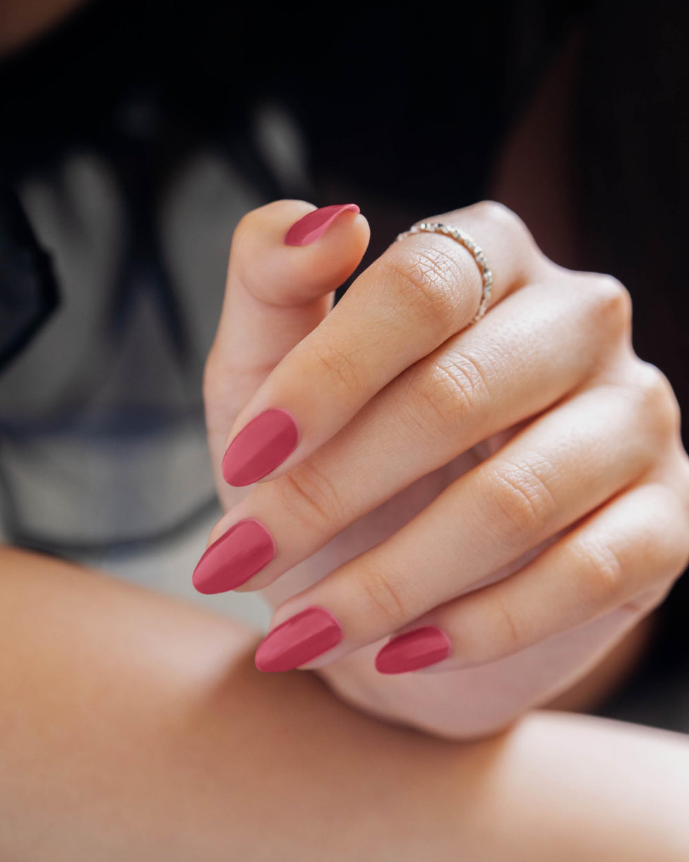 Gelish MINI high-gloss shine enhances vibrant manicure.