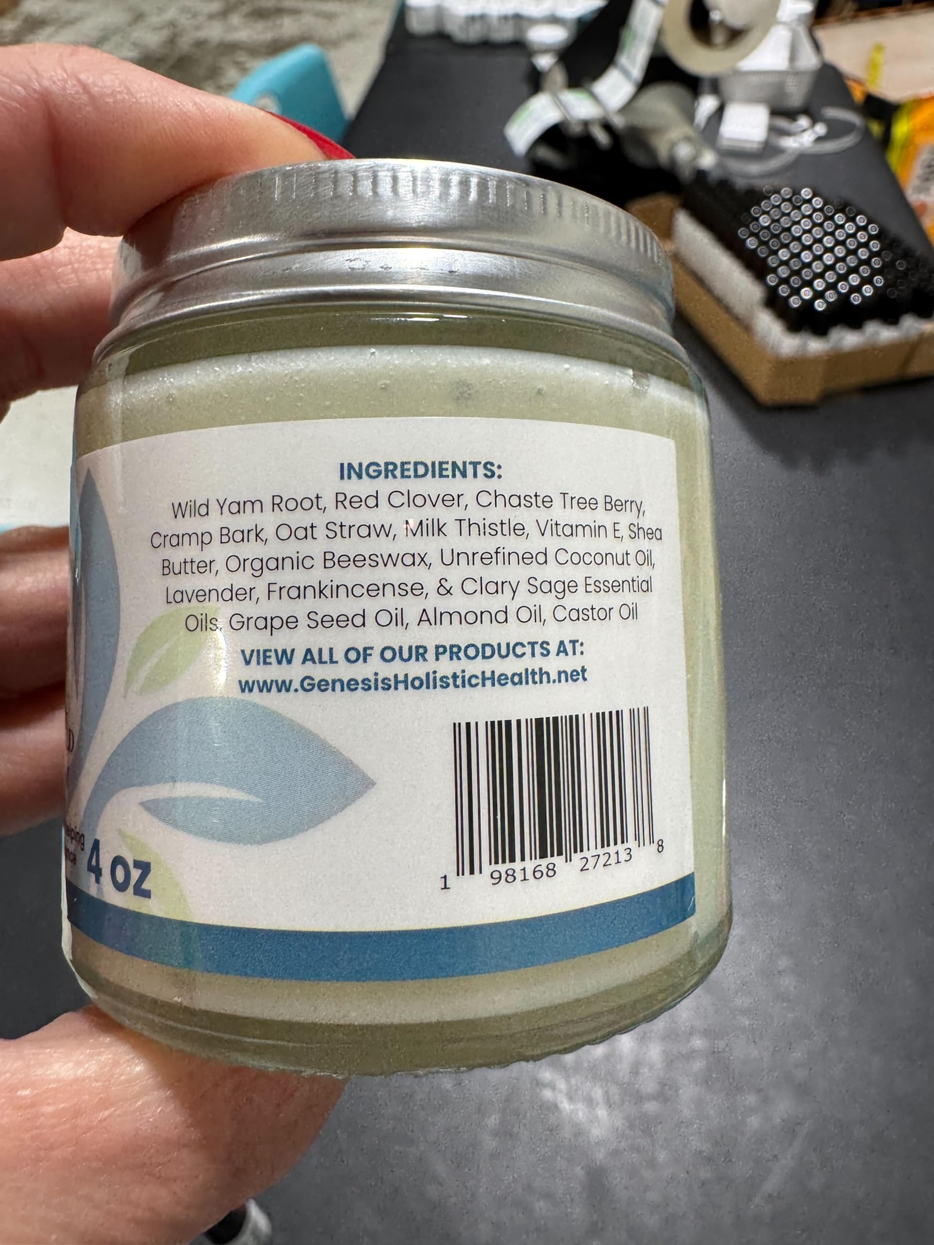 Close-up of Genesis Wild Yam Root Cream being applied with quick absorption
