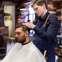 Genpai combs and clips organize styling during trims.