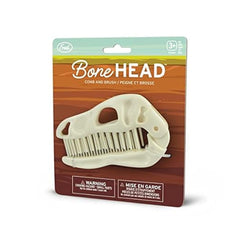 Genuine Fred Bonehead folding brush for compact travel detangling.