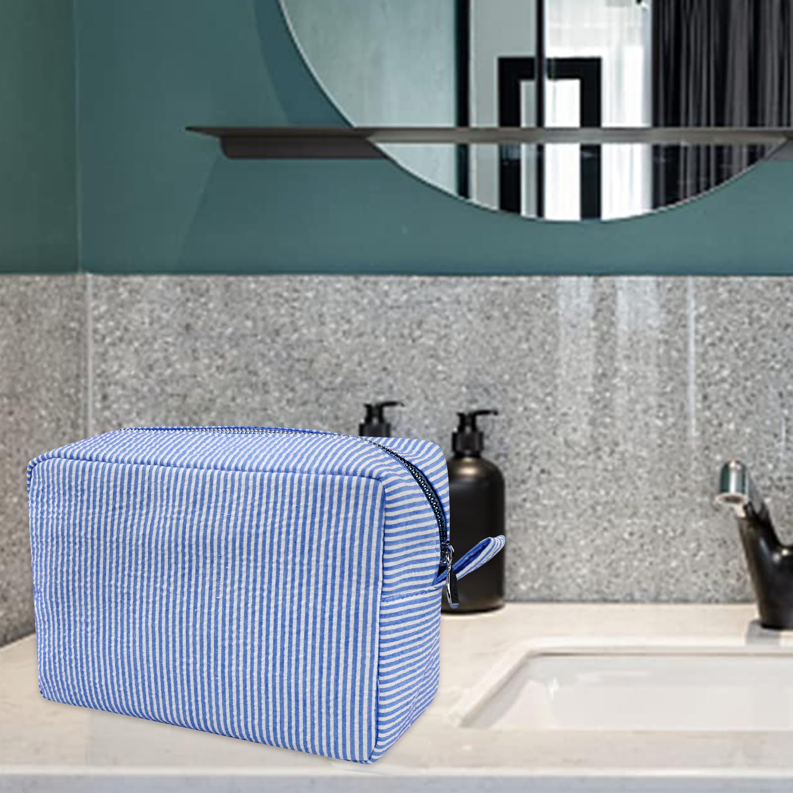 GFU makeup bag travel-compact design fits essentials like phone and brushes.