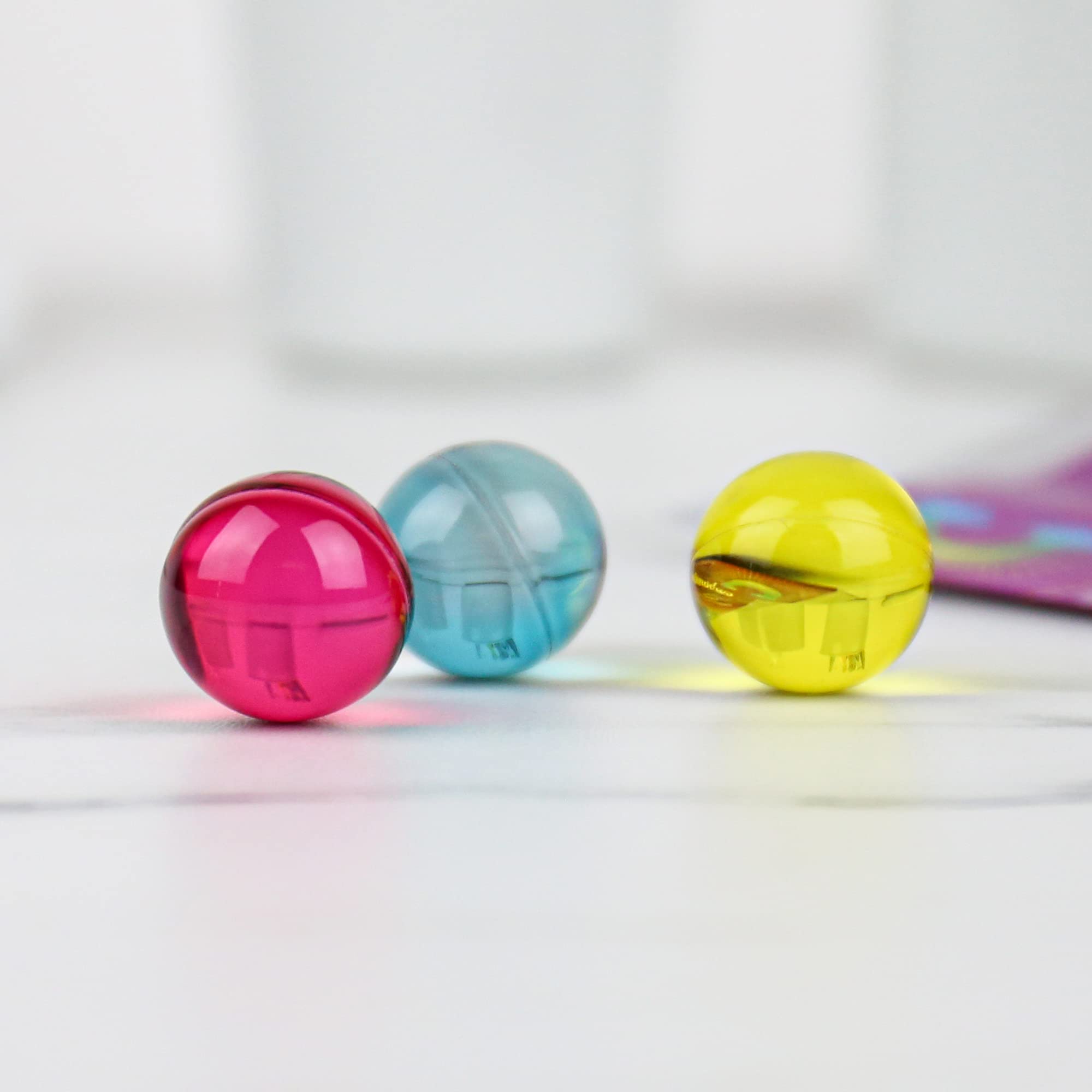 Gift Republic Liquid Spirit Rainbow Bath Pearls close-up highlighting moisturizing oil release