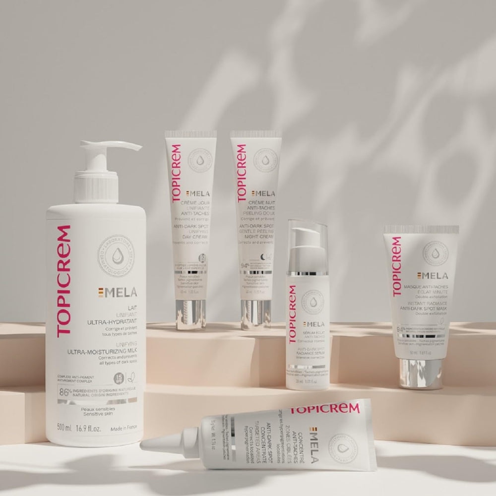 Topicrem GIGATEMP body milk application promotes even skin tone with gentle fragrance.