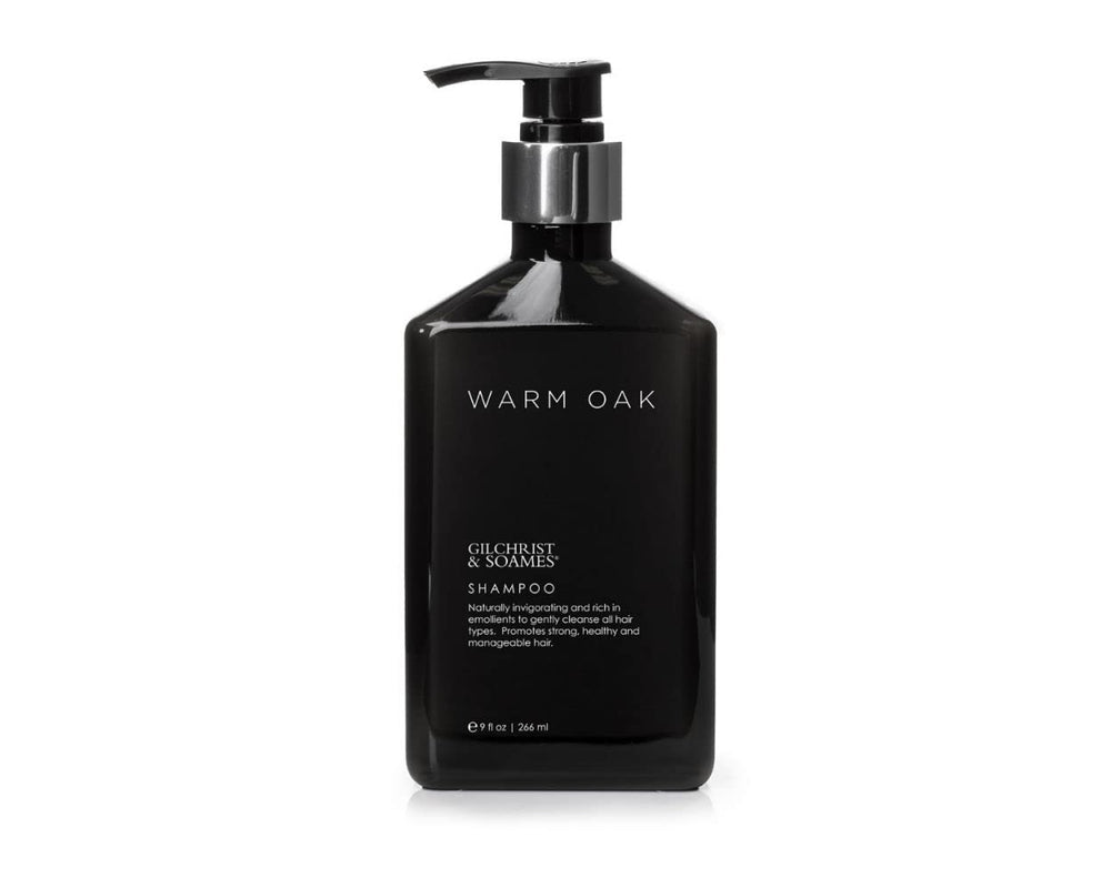 Gilchrist & Soames Warm Oak Shampoo bottle pour showcases easy cleansing for all hair types.