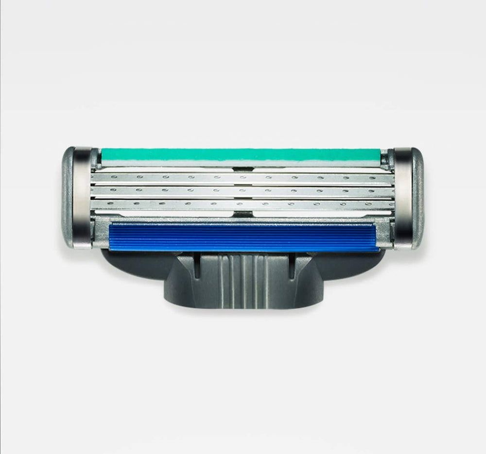 Gillette Mach 3 Turbo refill blades close-up shows triple blades for a smoother shave.