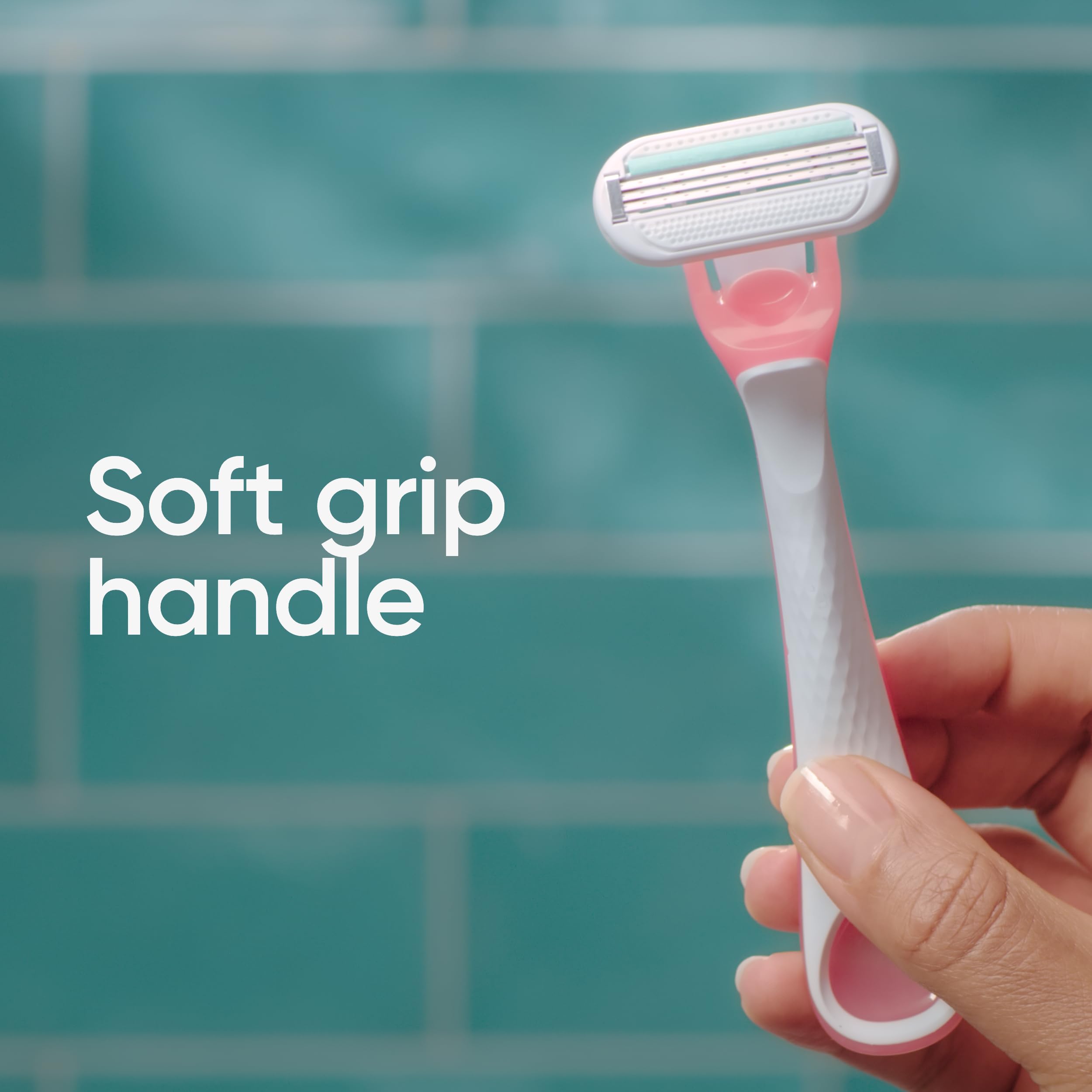 Gillette Venus razor held in hand to show scale and portability