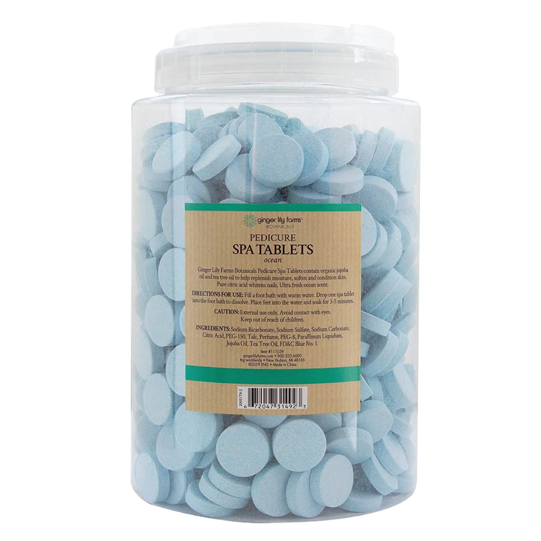 Ginger Lily Farms Botanicals dissolving tablet in water demonstrates quick effervescence for foot soak.