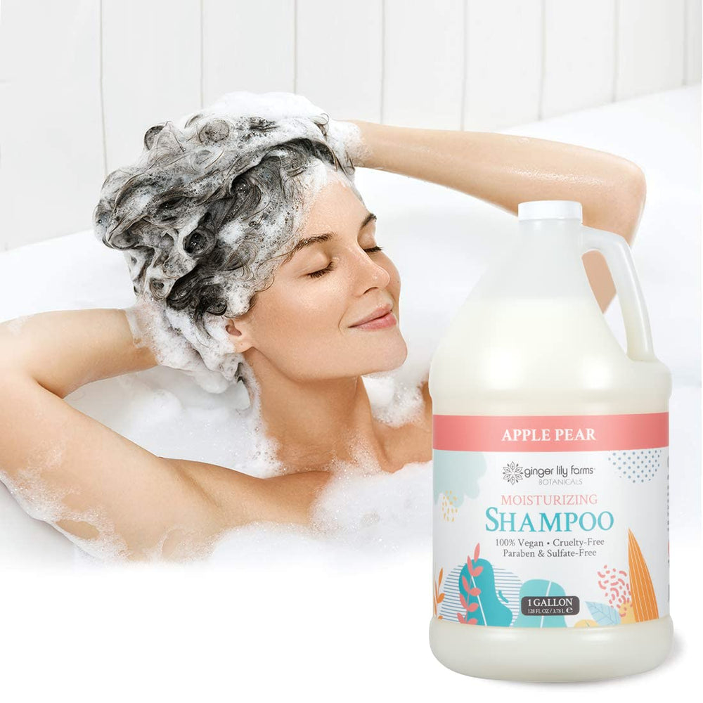 Ginger Lily Farms Botanicals Moisturizing Shampoo glass bottle on sink showing eco-friendly packaging