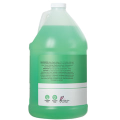 Ginger Lily Farms shampoo being applied to hair for smooth, revitalized strands