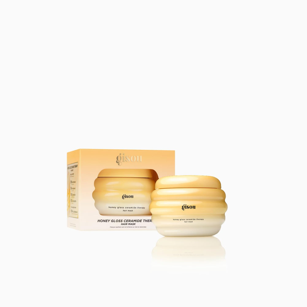 Gisou Honey Gloss Ceramide Therapy Hair Mask Mini jar-spread shows nourishing formula for strengthened strands.