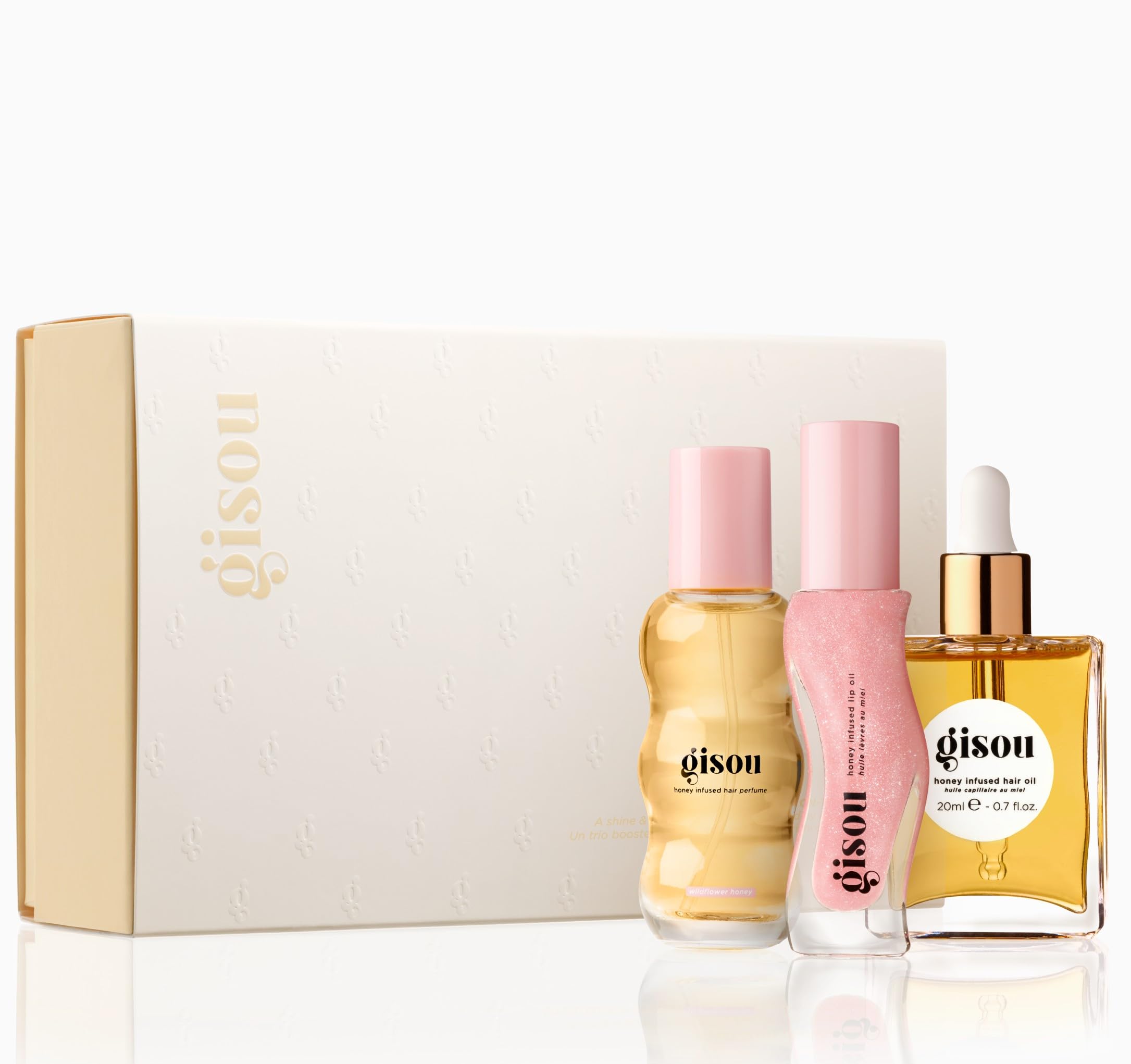 Gisou Honey Gloss On The Go Travel Set packaging shows a chic, travel-ready kit.